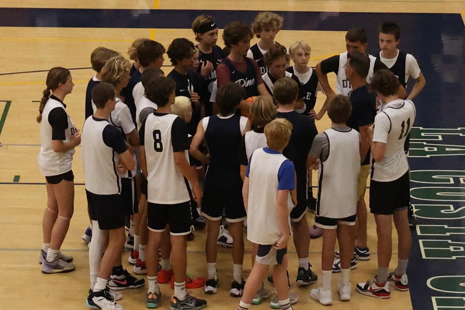 Coach Cassaw running a youth basketball camp